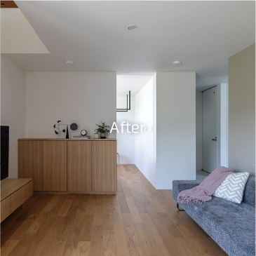 和室からリノベーションしたモダンなリビングの様子。明るい無垢材のフローリングと白い壁で、開放的で洗練された空間になっている。